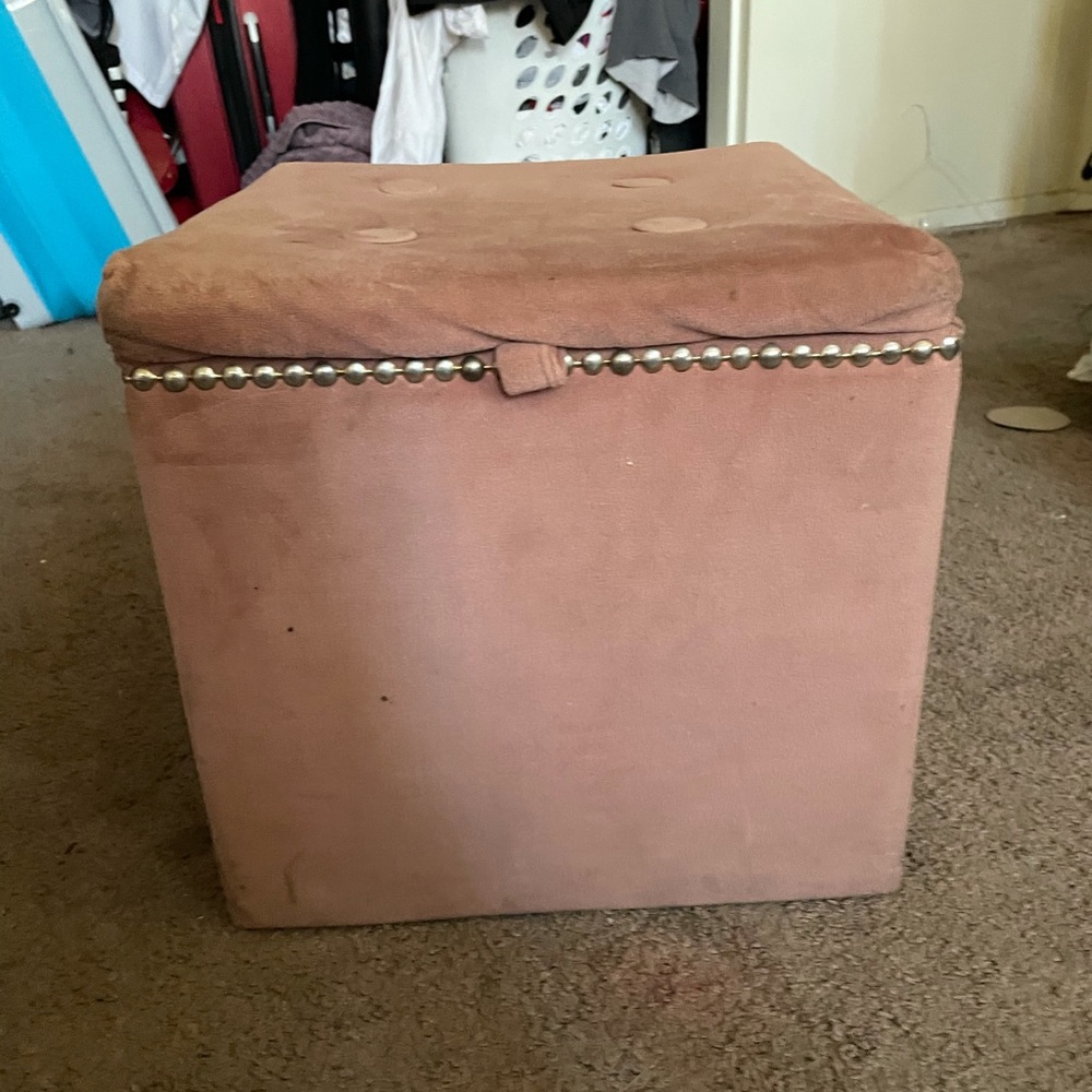 Pink velvet storage seat